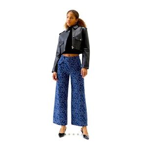 Denim trouser pants with embroidery and button pockets from Urban Outfitters